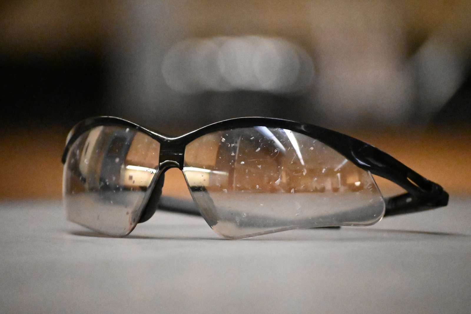 Photo of scratched safety glasses from an incident with a peroxide-forming chemical